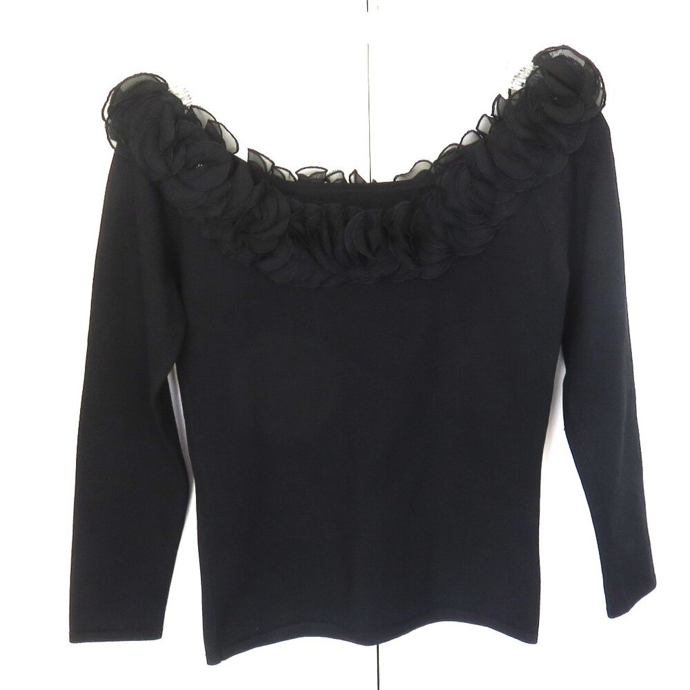 Black Knit Top with Chiffon Ruffle Neckline..........325